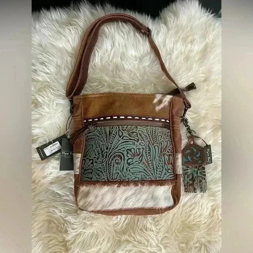 New Spring 2022 Myra Bag Cowhide Canvas Embossed tassel Leather Crossbod…